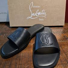 Christian Louboutin black leather mules