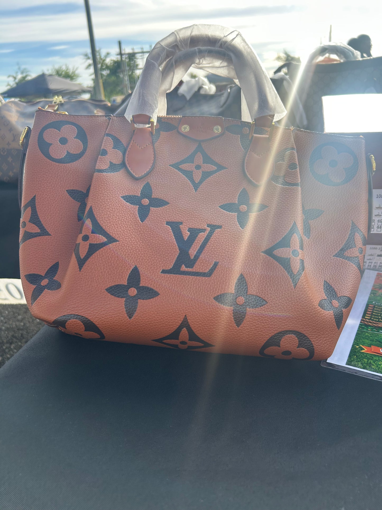 Louis Vuitton OnTheGo MM tote in Monogram Reverse coated canvas