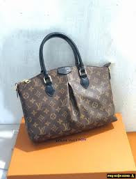 Louis Vuitton Boetie MM NM Monogram bag trimmed in black handles