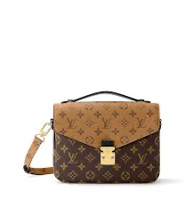 Louis Vuitton Pallas Chain Wallet featuring the signature Monogram Reverse canvas style