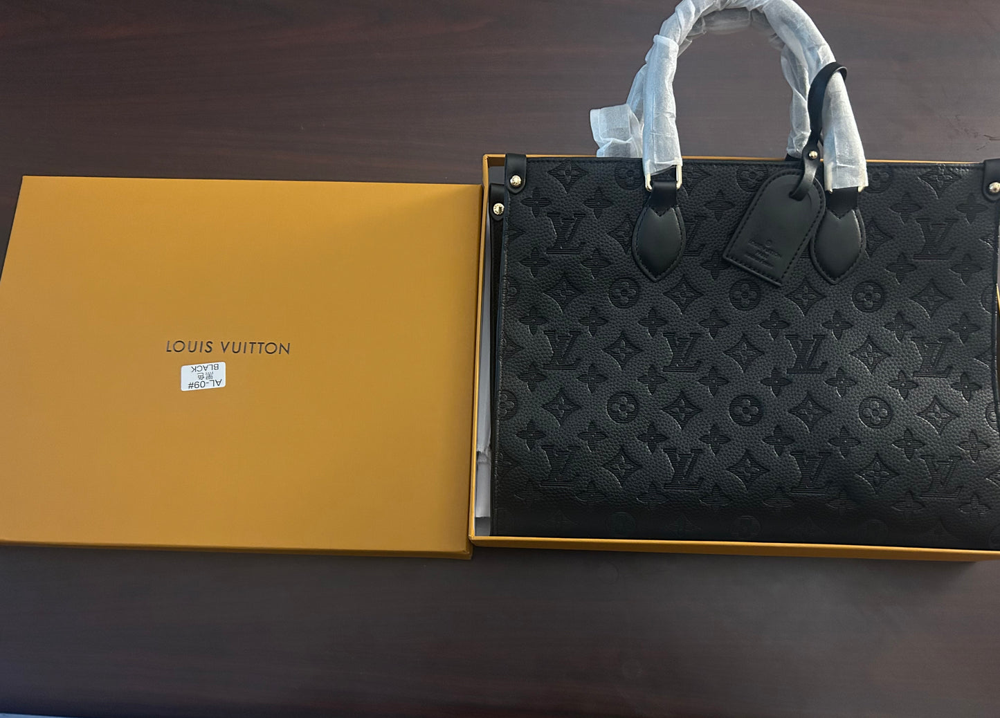 Louis Vuitton OnTheGo GM tote bag in black Monogram Empreinte leather