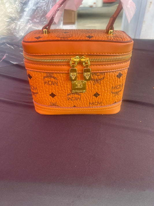 MCM Rockstar Vanity Case in Cognac Visetos monogram canvas