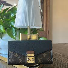 Louis Vuitton Pallas Chain Wallet featuring the classic monogram canvas paired with a green leather flap.