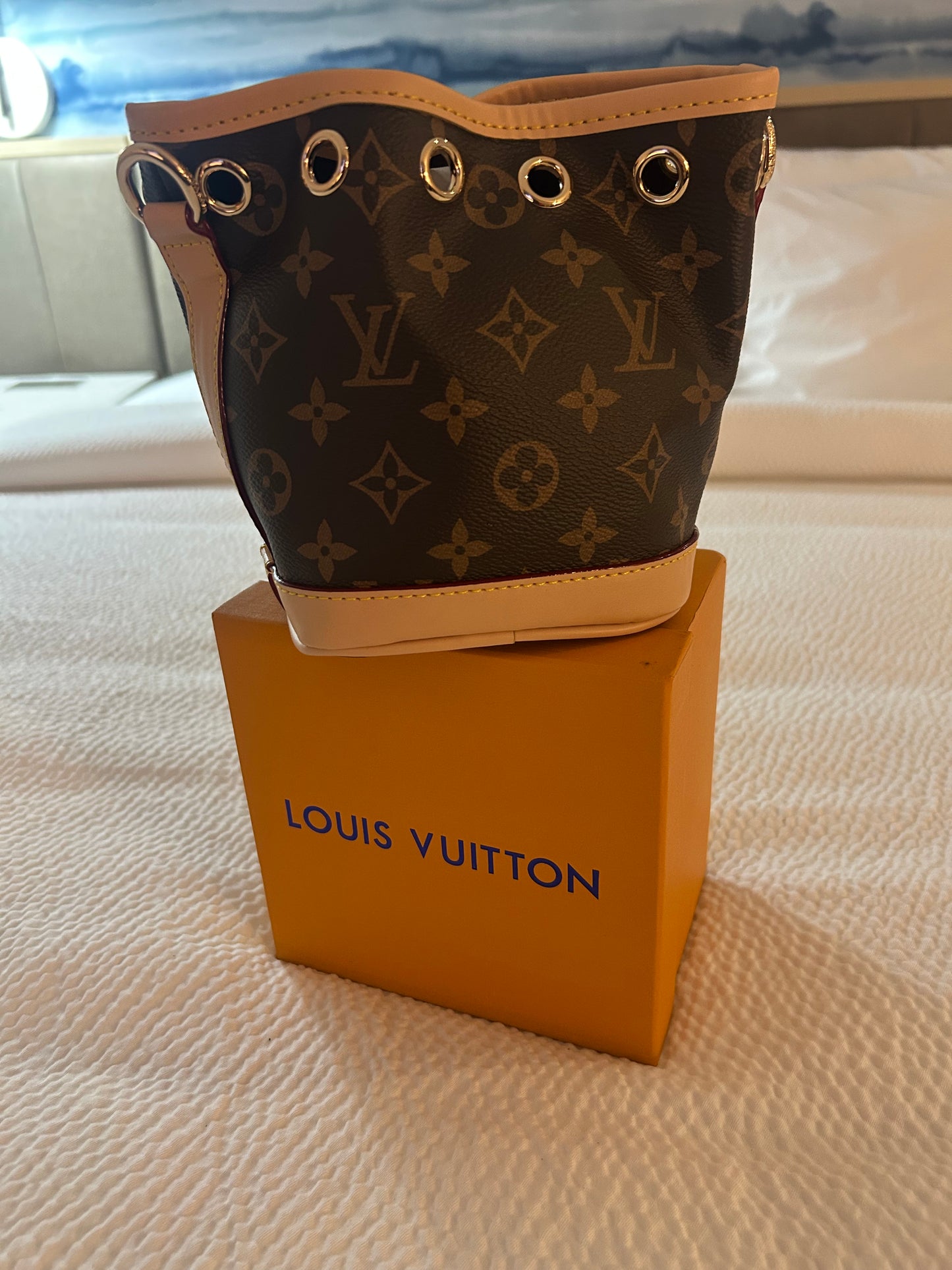 Louis Vuitton Drawstring Bucket Bag