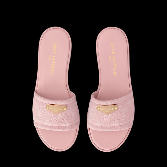 Louis Vuitton Lily Flat Mules in pink Monogram denim