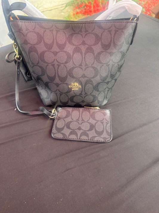 Coach Small Dufflette
In Signature Jacquard