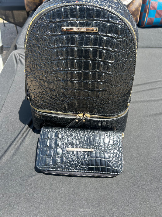 Brahmin Dartmouth backpack and matching wallet crafted from signature Black Melbourne croc-embossed leather